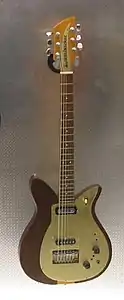 A 1957 Rickenbacker combo 400 with "tulip" style cutaways, and an added bridge pickup.