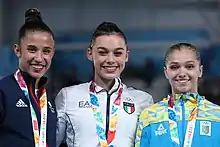 Floor exercise victory ceremony (from left to right): Amelie Morgan (Silver), Giorgia Villa (Gold), Anastasiia Bachynska (Bronze)