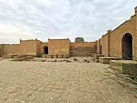 The courtyard of Enlil temple (E-U-GAL), the ziggurat is seen in the background