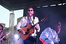 Bennett performing at Queens Square, Wolverhampton in 2018