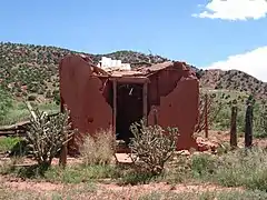 crumbling adobe building