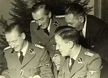 Christmas 1942 in Westerbork (from left to right) Albert Konrad Gemmeker&nbsp;[de], Hassel, Aus der Fünten and Scheltnes of Lippmann, Rosenthal & Co.