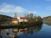 Froland Church located along the river Nidelva