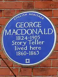 Blue plaque at No. 20, commemorating George MacDonald