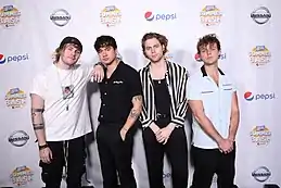 Image 164Typical late 2010s fashion of Australian band 5 Seconds of Summer in 2018 (from 2010s in fashion)