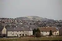 A mixture of housing, public and private, looking towards Hill o' Beath