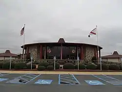 Exterior of the International Motorsports Hall of Fame in cloudy weather conditions