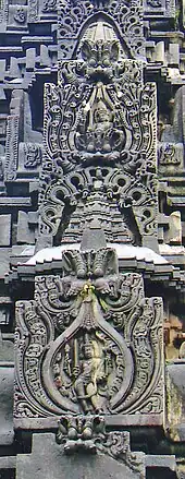 Kirtimukha (demon face) on shikhara (tower) of Kedareshvara temple at Balligavi