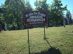 Sign in front of St. John the Baptist Church in Lattie's Brook