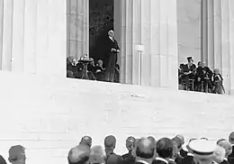President Harding gives a speech in front of the Lincoln Memorial.