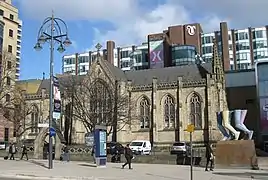 Mill Hill Chapel and the sculpture "Legs Walking"