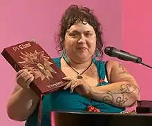 Lamm reads from her experimental novel 515 Clues at the San Francisco Public Library in 2015.