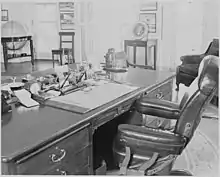  black and white photo of the back of the desk and chair Truman used