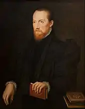 Bearded, red-headed man, seated 1555, 84 × 65&nbsp;cm, Santander Bank Foundation, Madrid, Spain