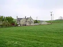 Picture of the rear of the old schoolhouse in Alnham.