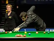 Ronnie O'Sullivan playing a shot