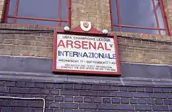 A placard advertising Arsenal's opening match in the Champions League against Inter Milan of Italy.