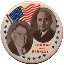 A campaign button with portraits of Harry S. Truman and Alben W. Barkley. The American flag can also be seen. "Truman and Barkley" is written below the portraits.