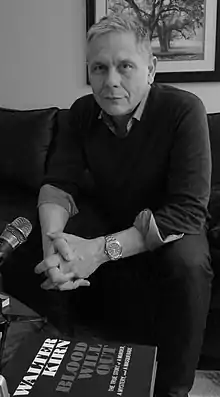 A black-and-white photograph of Walter Kirn