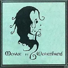 Black swirls and blotches on a teal background. When viewed in full the swirls form the face of a girl in profile.