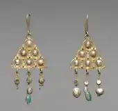 Pair of Byzantine earrings; 7th century; gold, pearls, glass and emeralds; 10.2 by 4.5 centimetres (4.0&nbsp;in ×&nbsp;1.8&nbsp;in); Cleveland Museum of Art (Cleveland)