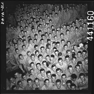 Young men training at pre-flight school at Del Monte Hotel, Del Monte, Calif., grin as they file out of the mess hall. [July 1943]